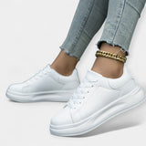 Weiße Leder-Sportschuhe