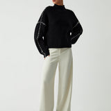 Alma | Oversize Pullover mit Rollkragen und Piqué-Details
