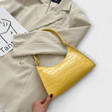 Véronique | Glänzende Lederhandtasche
