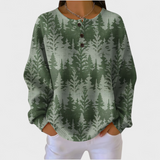 Grüner Pullover mit Tannenwald-Muster und Knopfleiste