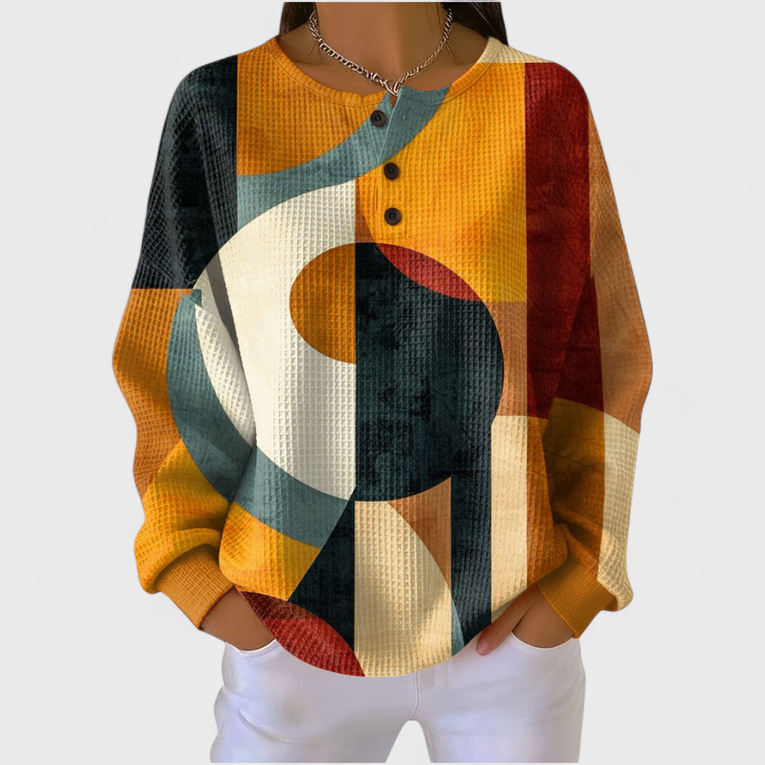 Pullover mit rundem Halsausschnitt, langen Ärmeln und gelbem Muster mit abstrakten Formen