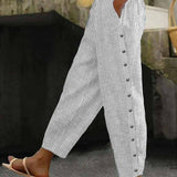 Gestreifte Knopfhose mit Knopfleiste und weitem Bein in hellem Blau