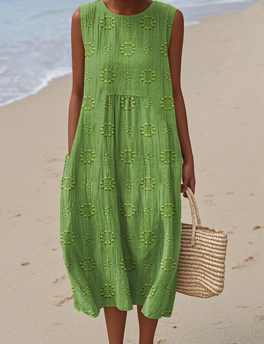 Grünes ärmelloses Strandkleid mit gemusterten Stickereien und Rüschenbund