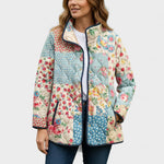 Steppjacke mit floralem Blüten-Patchwork, durchgehendem Reißverschluss und Stehkragen